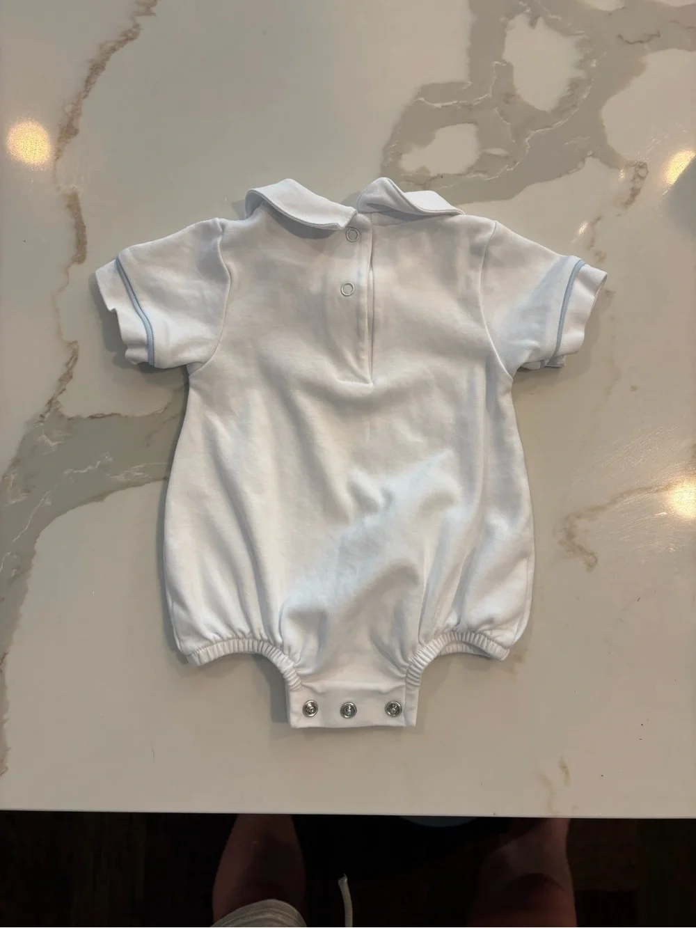 White Baby Polo Romper with Blue Trim and Tractor Embroidery